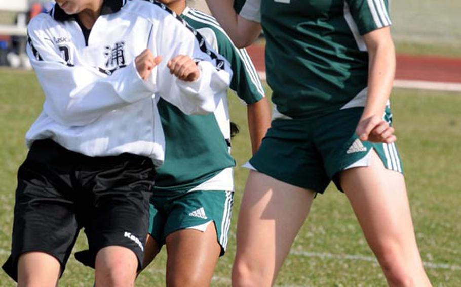 Elizabeth Fabila, right, Kubasaki's senior striker, enters the Pacific high school girls soccer season the active leader in goals with 100.