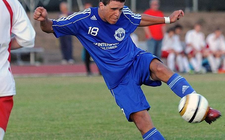 Ramstein's Cristian Turain gets off a shot in last year's Division I final against Lakenheath. Turain will return for the Royals as they try to defend their Division I title.