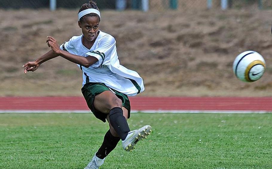 Alexandra Mack of Naples gets off a shot in last season's Division II championship game against Vicenza. Mack will be back this season to help the Lady Wildcats defend their title.