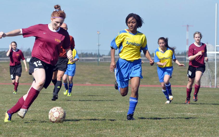 Alison Rittenhouse of Vilseck brings the ball down the field Saturday in Ansbach, Germany. The Lady Falcons held on to a 3-2 opening-day win against the Ansbach Cougars.