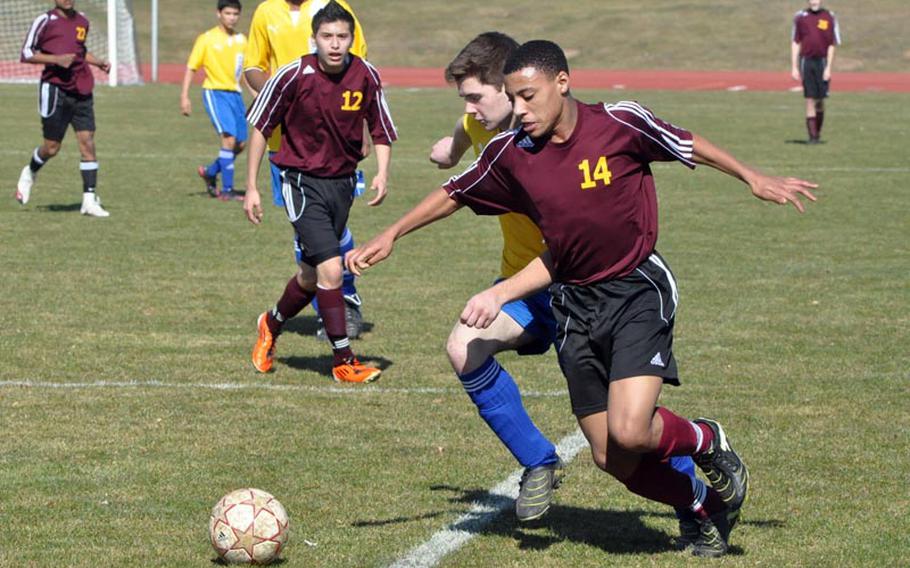 Joshua Drummond of Vilseck takes the ball around the Ansbach defense Saturday in Ansbach, Germany. The Vilseck Falcons captured their first win of the season 12-0. Drummond had a goal and an assist in the game.