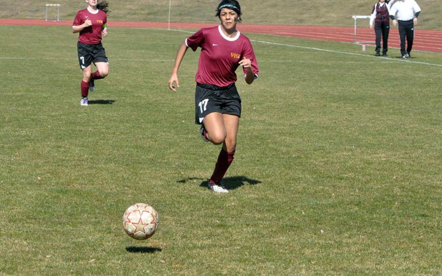 Marcella Rodriguez of Vilseck chases a loose ball Saturday in Ansbach, Germany. The Lady Falcons held on to a 3-2 opening-day win against the Ansbach Cougars.