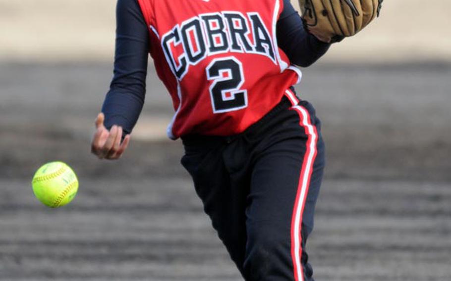 E.J. King right-hander Nika Stephens delivers against  Nile C. Kinnick during Saturday's championship game in the DODDS Japan girls softball tournament at Yokota Air Base. The Red Devils edged the Cobras 9-8 for the title.