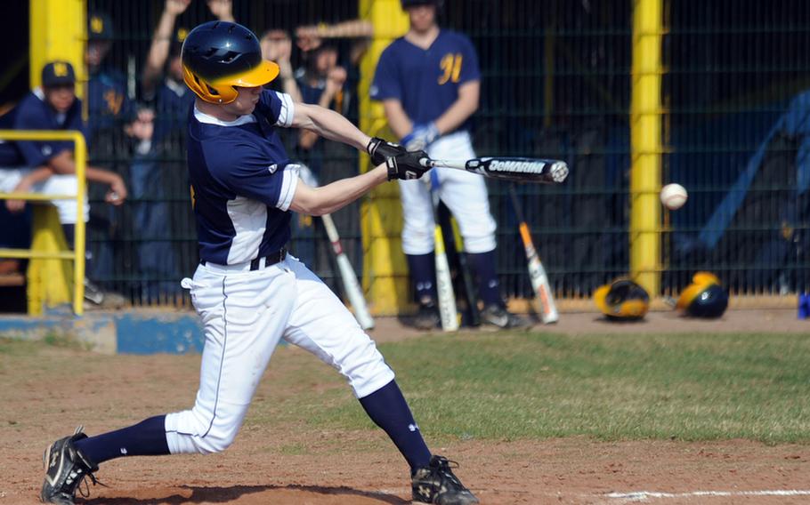 Heidelberg's Andrew Baxter connects in the Lions' 13-3 home win over Ansbach, Saturday. The Lions swept a doubleheader winning the second game 18-5.