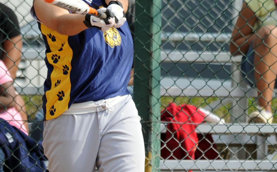 Heidelberg's Rebecca Luna connects for an inside-the-park homer in the Lady Lions' 22-1 win over Ansbach in the second game of a doubleheader in Heidelberg, Saturday. Heidelberg won the first game 10-9.