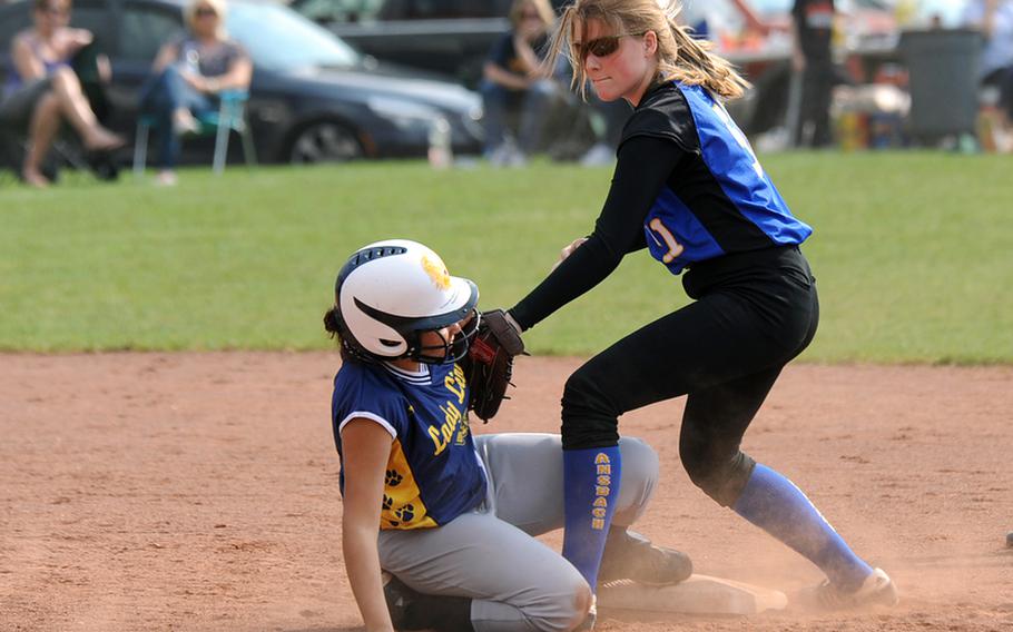 Ansbach's Shelby Farnham puts the tag on Heidelberg's Kayla Weber after she tried to steal second base. Weber was out here, but she was the winning pitcher in the Lions' 22-1 victory in the second game of a doubleheader at home, Saturday. Heidelberg won the first game 10-9.