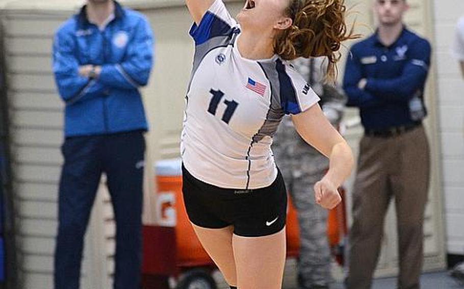 Michelle Harrington serves the ball during the championship match against Germany, Wednesday, during NATO&#39;s Allied Air Command volleyball tournament, held at RAF Lakenheath, England. The female and male U.S. teams finished the tournament in first and third place, respectively.