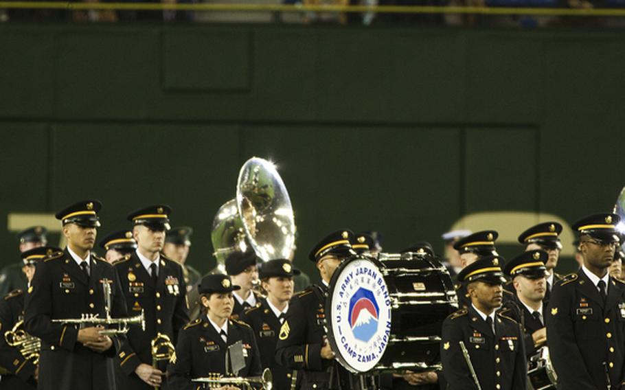 Memebers of the U.S. Army Japan Band at the American League season opening MLB baseball game between the Seattle Mariners and the Oakland Athletics in Tokyo.
