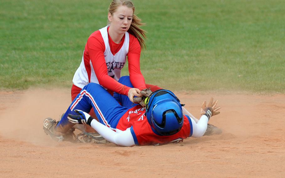 Lakenheath's Lexi Knupp puts the tag on Ramstein's Haley Haden on an attempted steal at second base. Knupp got Haden but Ramstein beat the visiting Lancers 15-0 in the first game of a doubleheader Saturday.