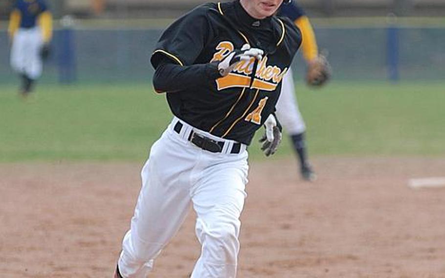 Patch's Andrew Buxkemper rounds third base on the way to home during the second game of a Saturday doubleheader against the Heidelberg Lions. Patch won both games.