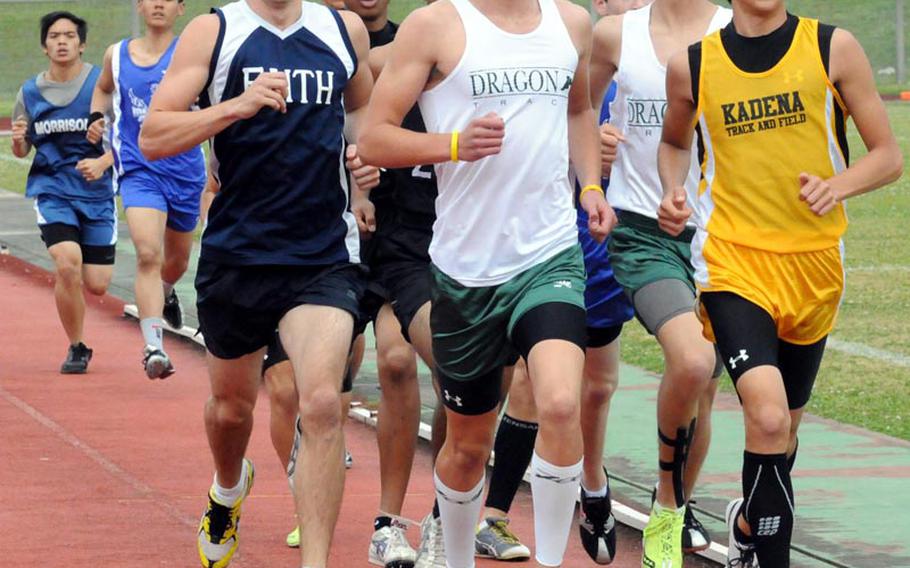 Reigning Far East cross-country champion Erik Armes, a Kubasaki freshman, is flanked by Luke Seaborn of Faith Academy and Kadena's Andrew Kilkenny as he leads the pack in the 3,000-meter run Friday in the 9th Alva W. "Mike" Petty Memorial Track & Field Meet at Camp Foster, Okinawa. Armes won in 9:46.78.