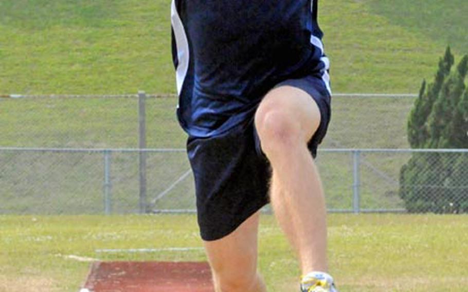 Daniel Root of Faith Academy, Philippines, long jumps on Friday in the 9th Alva W. "Mike" Petty Memorial Track & Field Meet at Camp Foster, Okinawa. Root won with a leap of 5.63 meters.