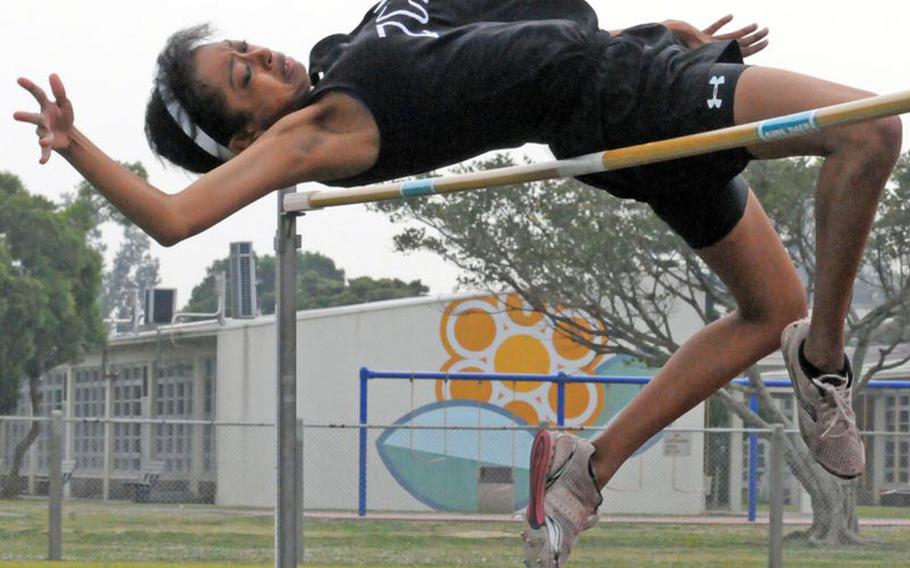 Arrianna Guerra of Zion Christian Academy of Okinawa clears 1.52 meters in the high jump Friday in the 9th Alva W. "Mike" Petty Memorial Track & Field Meet at Camp Foster, Okinawa. Guerra came within .02 meters of the meet record set six years ago by Kyera Tennyson of Kubasaki.