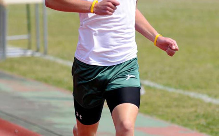 Erik Armes of Kubasaki heads toward the finish of the boys 1,500 during Saturday's running finals in the 9th Alva W. "Mike" Petty Memorial Track and Field Meet at Camp Foster, Okinawa. Armes won the event in 4 minutes, 15.14 seconds.