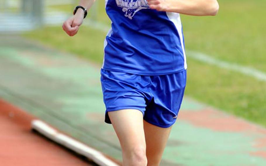 Seoul American senior Amanda Henderson heads for the finish in the 1,500 during Saturday's running finals in the 9th Alva W. "Mike" Petty Memorial Track and Field Meet at Camp Foster, Okinawa. Henderson, a two-time Far East cross-country champion, ran the 1,500 in 5 minutes, 1.23 seconds, a northwest Pacific high school record, beating American School In Japan's Jennifer Stolle's mark of 5:02.97 set three years ago.