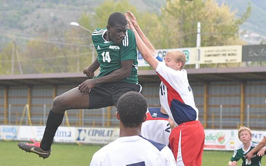 Naples' Nigel Alexander heads the ball toward the Aviano goal after a corner kick Saturday. Alexander would be thwarted in this attempt, but score later in the Wildcats' 3-0 victory.