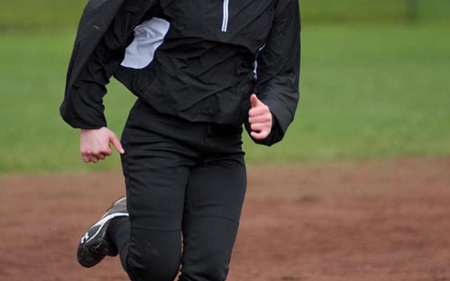 Patch senior Haile Baker heads into third base on Saturday during a doubleheader against the host Lady Warriors from Wiesbaden. Patch, the defending Division I DODDS-Europe champion, won both games.