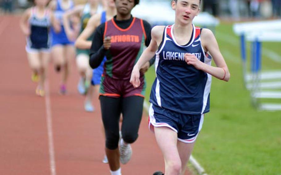 Lakenheath's Zoe Yancey-Lopes begins lap two of the 1,600-meter run during Saturday's track meet at RAF Lakenheath, England. Yancey-Lopes, finished the race in sixth place with a time of 6 minutes, 26 seconds.