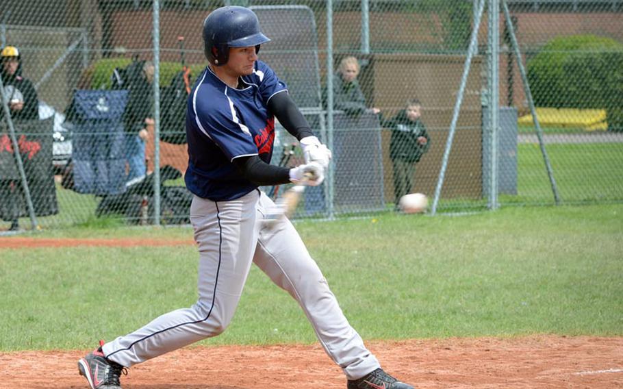 Lakenheath's Kyle Capogna swings at a pitch during a game against the Bitburg Barons, Saturday, at RAF Feltwell, England. The Lancers defeated the Barons in both games of a doubleheader.