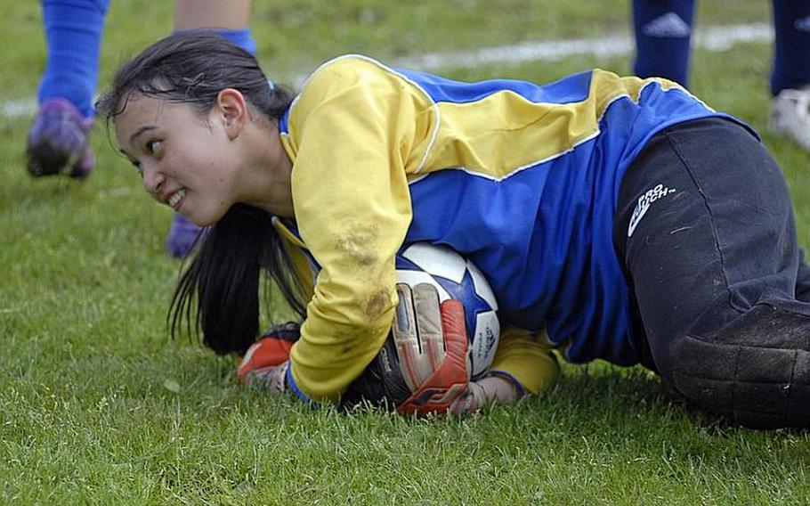 Bitburg sophomore goalie Isabella Madamba snags a save during DODDS-Europe high school soccer action on Saturday. Despite a tough effort, Bitburg was outlasted by the host squad from Wiesbaden, 4-0.