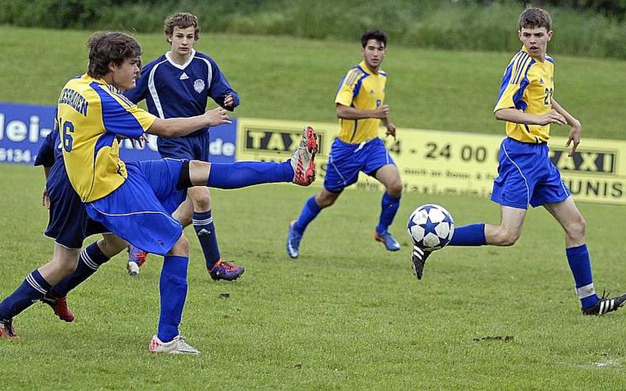 Wiesbaden junior Devan Tisdale sends the ball flying on Saturday during his squad's 7-0 victory over Bitburg.
