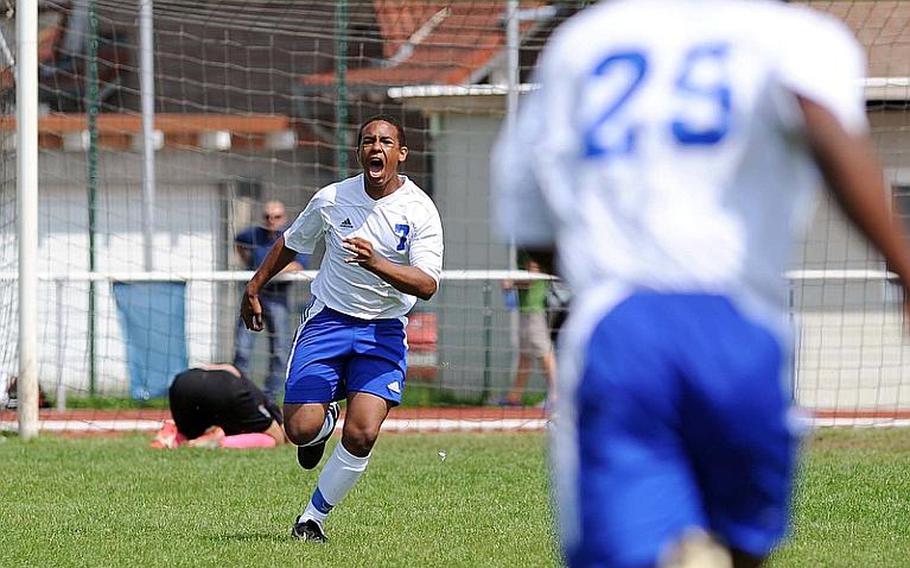 Jordan Akalaonu of Hohenfels sprints to his teammates as he celebrates his winning goal in a shootout against AFNORTH in a Division II game at the DODDS-Europe championships. The win advanced the top-seeded Tigers to the next round.