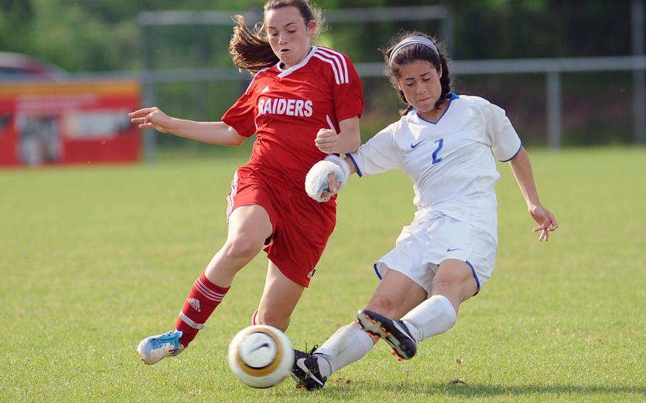 Kaiserslautern's Arianna Osmar blocks a pass by Ramstein's Josie Seebeck in a Division I semifinal at the DODDS-Europe soccer championships. Ramstein won 4-1 to advance to the finals against Patch.