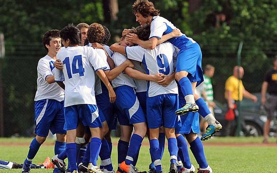 Marymount International players celebrates their 1-0 win over Black Forest Academy in the boys Division I final at the DODDS-Europe soccer championships.