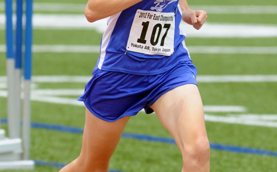 Seoul American senior Amanda Henderson runs the 1,500 in a Far East meet record 4 minutes, 56.45 seconds during Thursday's final in the Far East High School Track and Field Meet at Yokota Air Base, Japan. Henderson also won the 800 and 3,000, each in meet-record time, eclipsing the records of her former teammate Siarria Ingram.