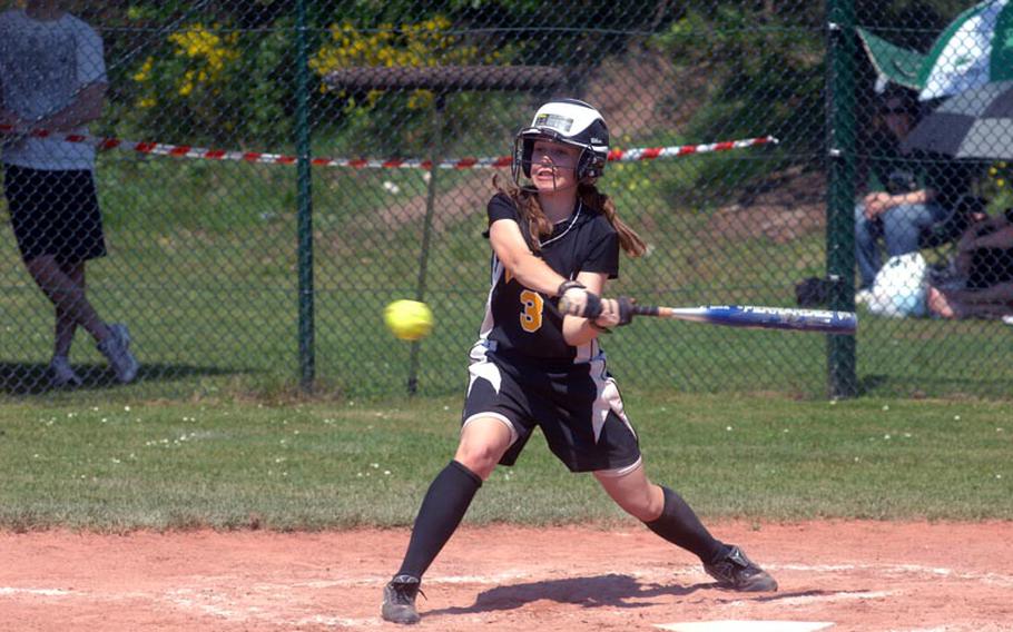Patch sophomore Paige Miller swings during Thursday's 12-1 win over Lakenheath High School, part of opening pool play in the European high school softball championships at Ramstein High School.
