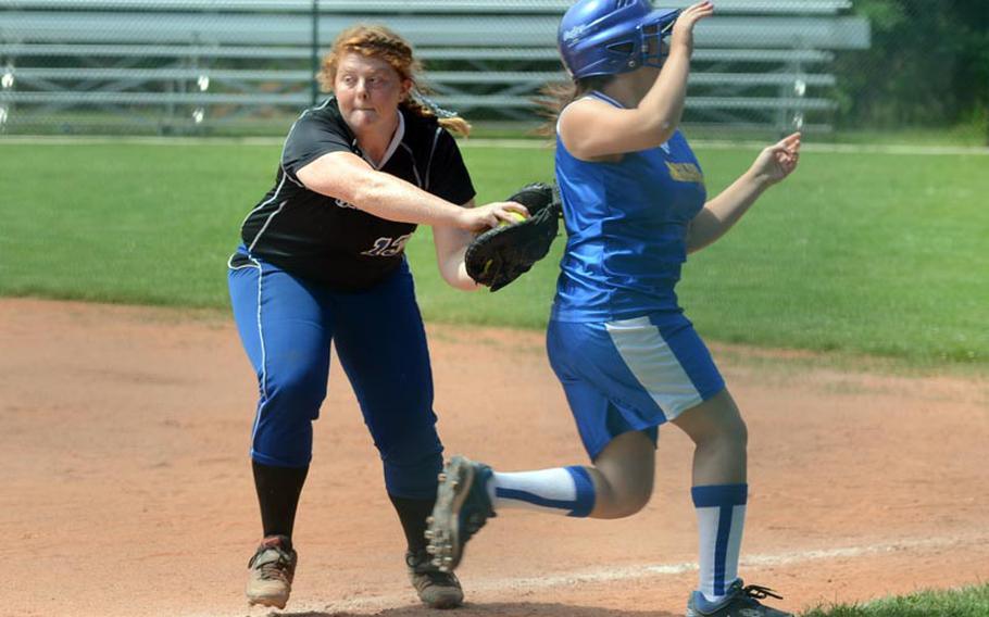 Incirlik first baseman Kathryn Culver tags Dinayda Garcia of Sigonella during the second day of action in the DODDS-Europe softball tournament Friday at Ramstein Air Base in Germany. Incirlik won 18-2.