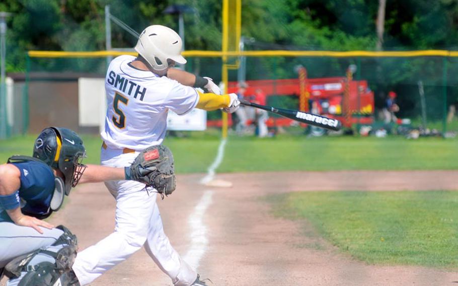 Patch's Jack Smith hits a home run over the right center wall during a Division I semifinal game Friday in the DODDS European baseball championships.