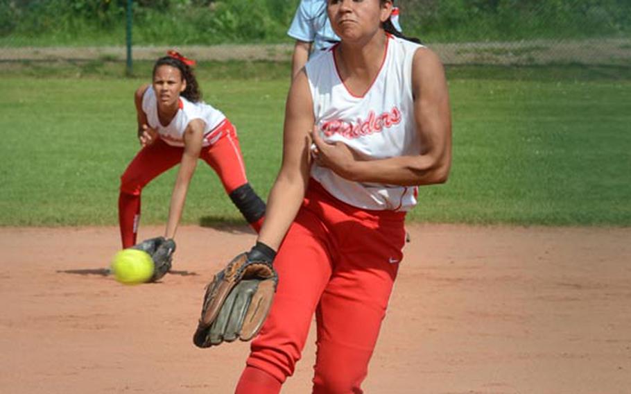 Kaiserslautern's Lauren Hawkins sends the ball toward home plate during a 12-3 losing effort against Vilseck in DODDS-Europe Division I play Friday at Ramstein Air Base in Germany. The loss was the first for the Red Raiders on the season.