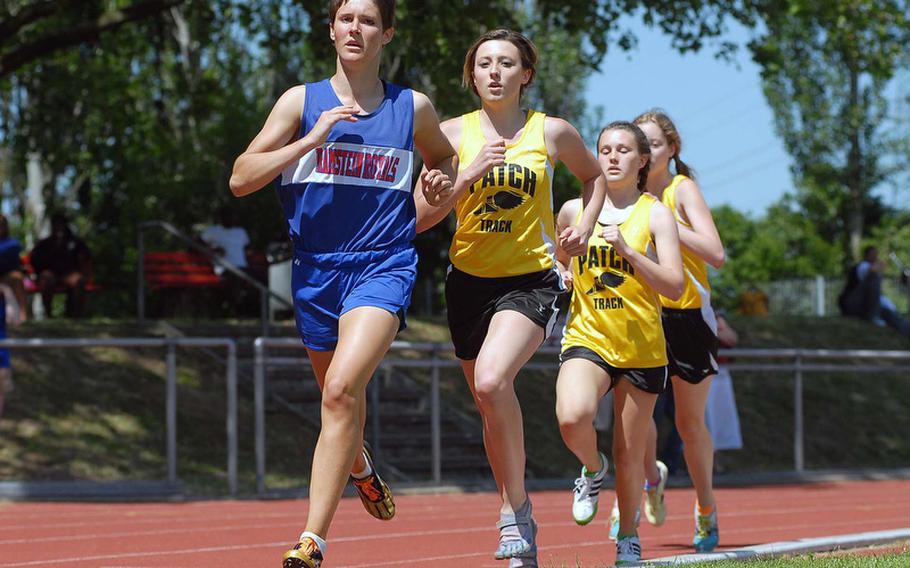 Ramstein's Jessica Kafer leads Patch's Christina Hamilton, Baileigh Sessions and Hannah Rose around the track  early in the 1,600-meter race. Kafer won in 5 minutes, 13.08 seconds. She has been selected  Stars and Stripes girls Athlete of the Year for track.