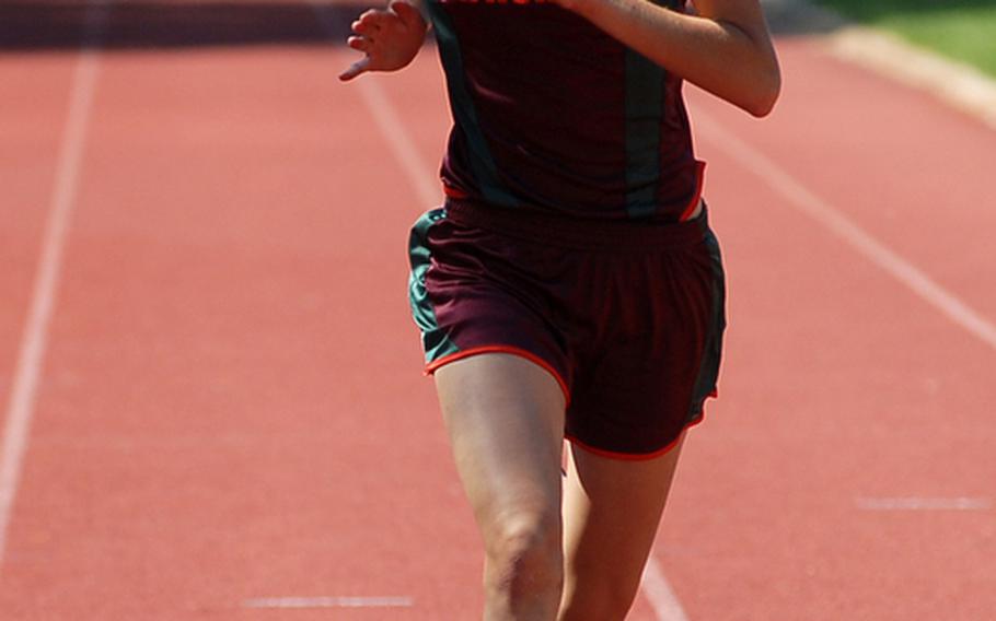 AFNORTH's Sara Sawyer sprints to the finish line in the 200-meter race at the DODDS-Europe track and field championships in May. Sawyer, a senior, has been named the DODDS-Europe female Athlete of the Year.