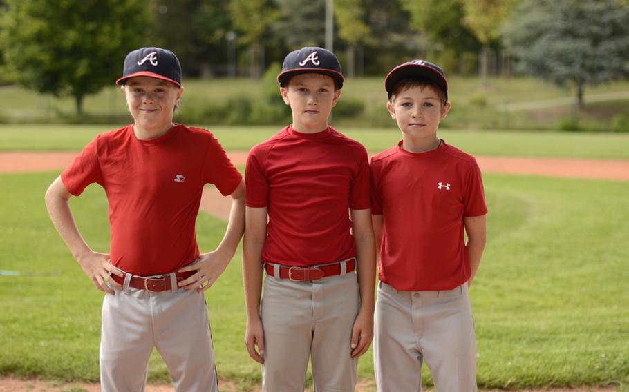 Kaiserslautern Military Community All-Stars from left, Jerry VanSickle, Nick Notgrass and Ethan Vincent, pose for a photo Aug. 2, 2012, on Ramstein Air Base, Germany, before heading to the Little League World Series in Williamsport, Pa.  The series takes place Aug. 16-26.