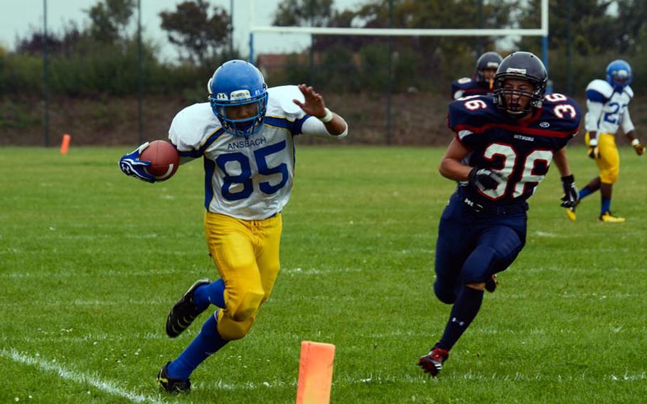 Ansbach's Damien Quichocho gets by Biburg's Christian Diaz and stays in bounds to score a touchdown on a 33- yard pass from quarterback Jake Voorhees.