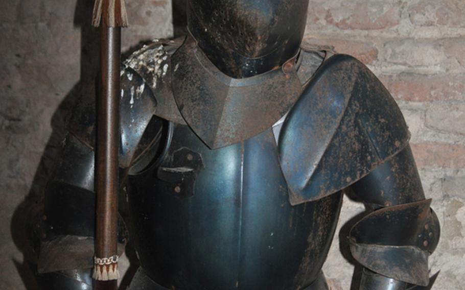 A suit of armor greets people climbing the stairs of the Ezzelino tower in Montagnana, Italy. The tower is part of Castello di San Zeno, which hosts the tourist office and a municipal museum.