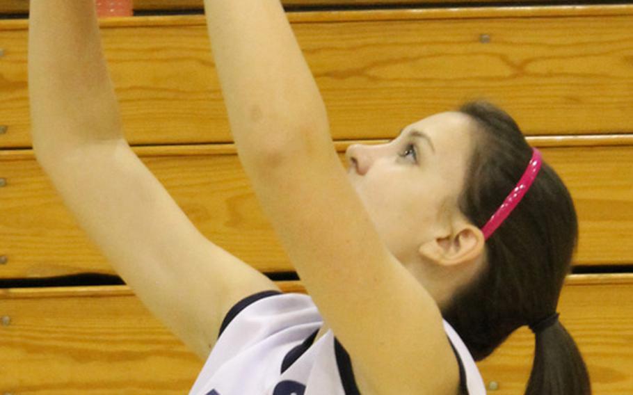 Seoul American junior setter Ashley Clement sets the ball during practice Tuesday at Yongsan Garrison, South Korea. 