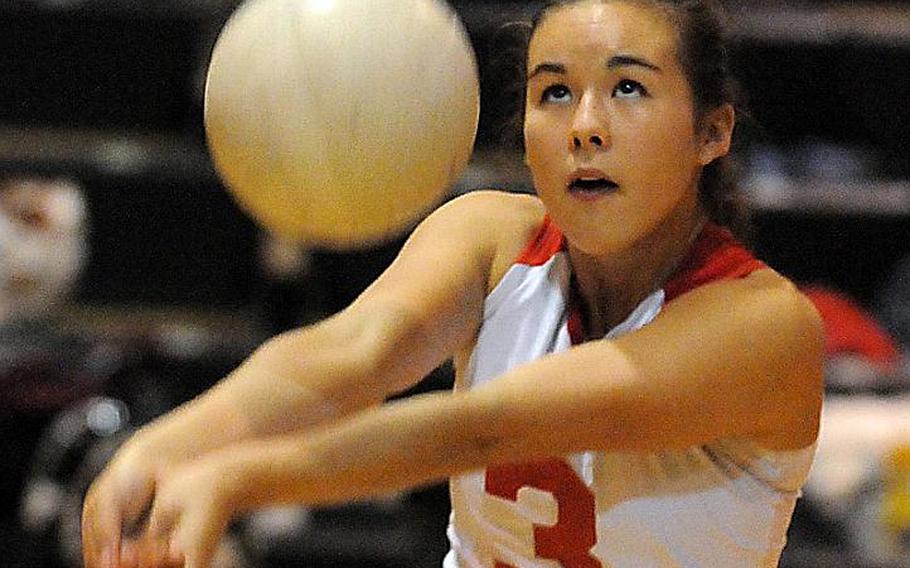 Nile C. Kinnick junior libero Kaile Johnson digs the ball during warmups before last week'ss three-set DODDS Japan-Kanto Plain victory at Zama American. Johnson has averaged 12 defensive digs for a Red Devils team that's gone 16-0 this season, 91-1 in the last three-plus regular seasons, is the only team to win three straight DODDS Japan and Kanto Plain titles in history and finished second in last fall's Far East Division I Tournament.