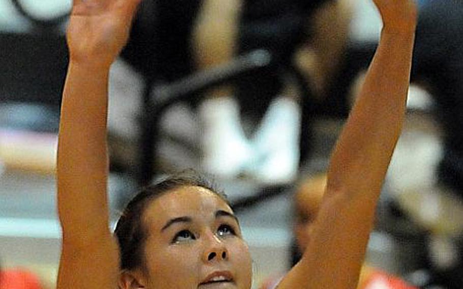 Nile C. Kinnick junior libero Kaile Johnson sets the ball during warmups before last week's three-set DODDS Japan-Kanto Plain victory at Zama American.