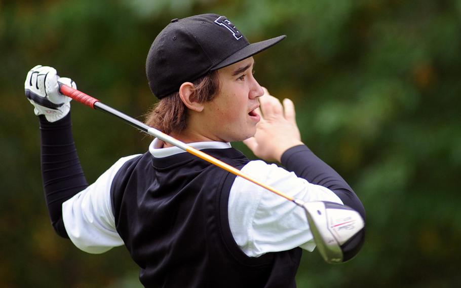 Defending boys champion Joe Patrick of Heidelberg watches his tee shot fly down the fairway in the opening round of the DODDS-Europe on his home course on Thursday. Patrick is tied with Ramstein's Christian Gunia going into Friday's final round after shooting a modified Stableford 49.