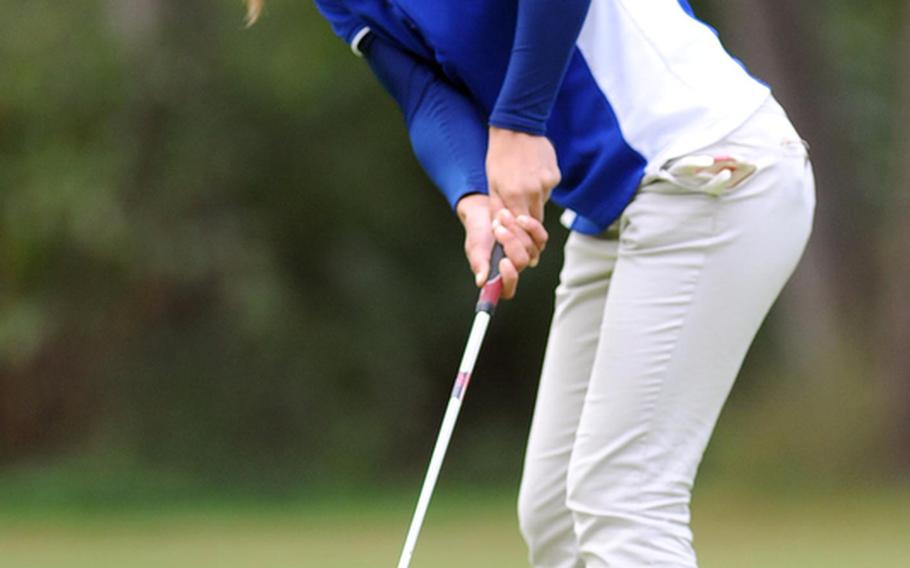 Defending champion Jenna Eidem of Wiesbaden watches her putt roll towards the cup during first round action at the DODDS-Europe golf championships at the Heidelberg Golf Club, Thursday. Eidem shot a modified Stableford 39 to lead going into Friday's final round. She is followed by Ashley Kranz, Demetrah Lewis and Michelle Turner of Ramstein.