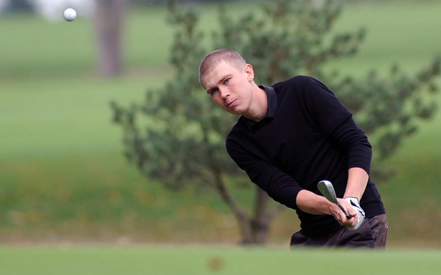 Bahrain's Ilya Goniker watches his chip shot head to the green in opening day action at the DODDS-Europe golf championships at the Heidelberg Golf Club, Thursday. Goniker is tied with Lakenheath's Kyler Zachery for fourth going into Friday's final round.