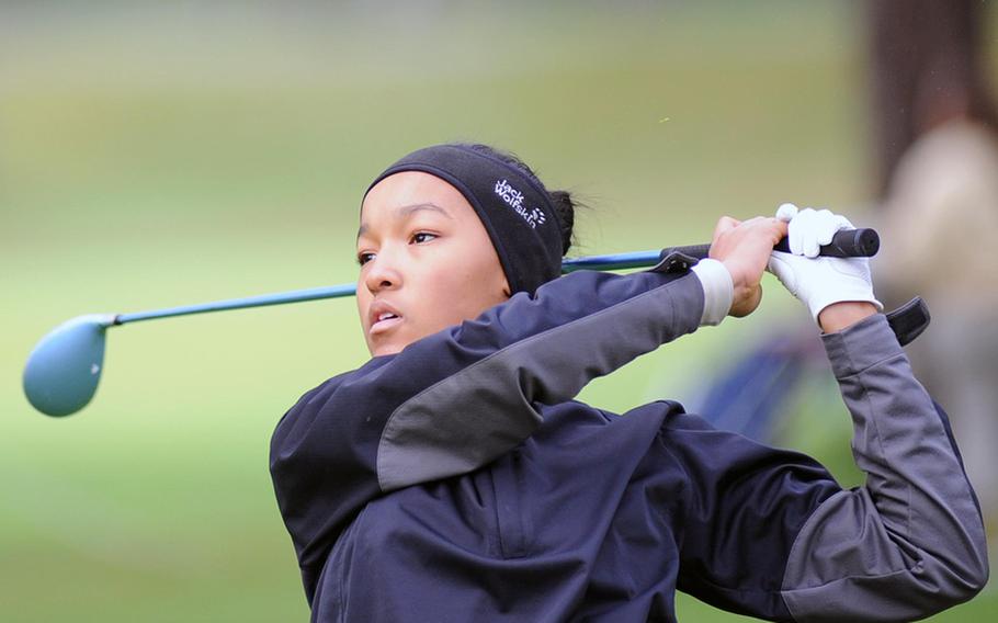 Ramstein's Demetrah Lewis follows her tee shot on opening day of the DODDS-Europe golf championships at the Heidelberg Golf Club, Thursday. Lewis is tied with teammate Michelle Turner for third going into Friday's final round. Both scored 19 modified Stableford points.