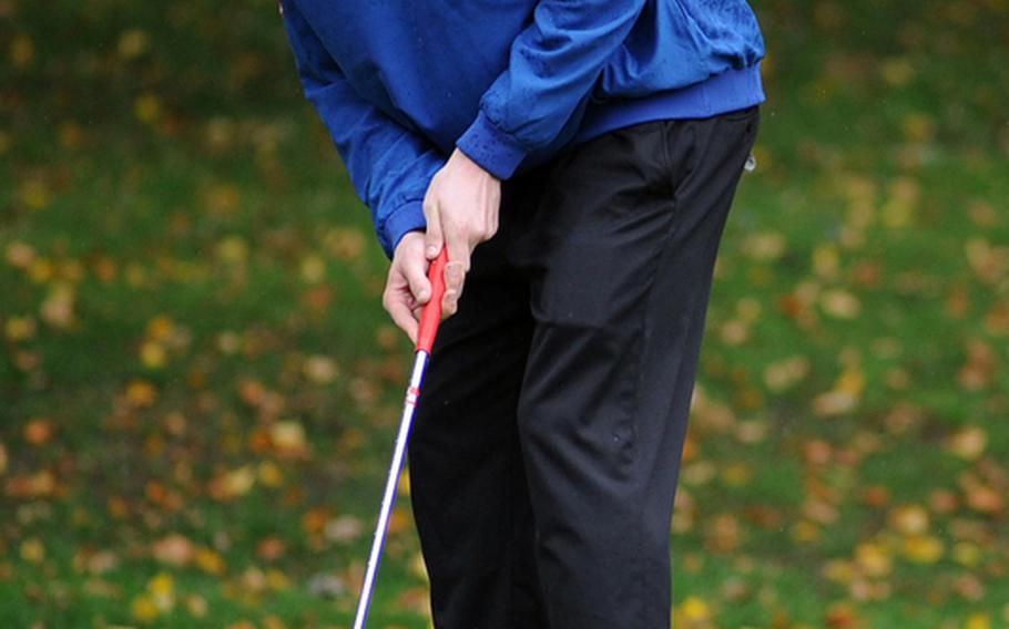 Ramstein's Christian Gunia watches his putt roll towards the cup in final round action at the DODDS-Europe golf championships. Gunia finished second with a modified Stableford score of 89.