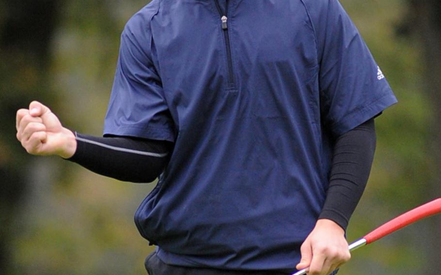 Heidelberg's Joe Patrick reacts to a long putt falling into the cup in final round action at the DODDS-Europe golf championships. Patrick, the defending champion finished fourth in this year's event.
