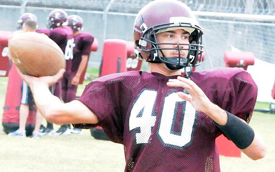 Matthew C. Perry junior varsity football senior quarterback Chris McQuillen is a former Kadena varsity player.