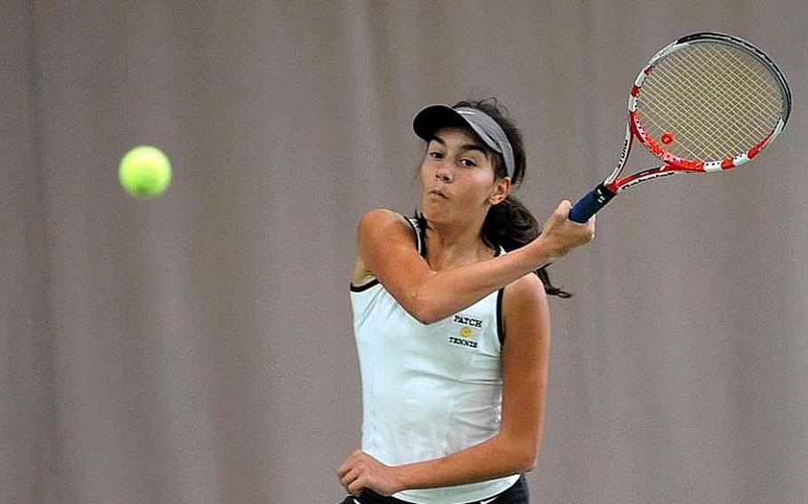 Top-seeded Eugenia Srodowski of Patch returns a shot from defending champion Meghan Augsburger in their semifinal match at the DODDS-Europe tennis championships. Srodowski won 6-1, 6-4, and will face Alexandria Bellas od AFNORTH in Saturday's final.