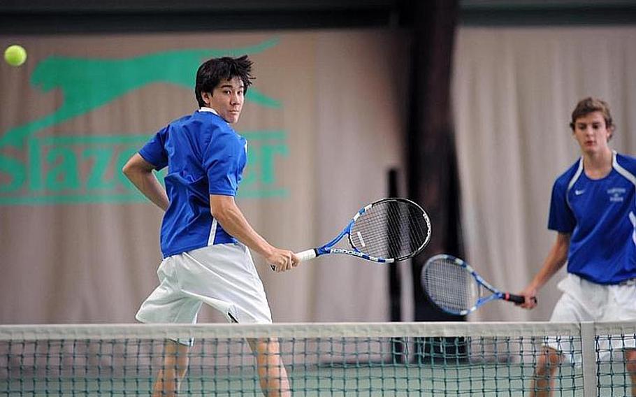Ramstein's Lee DeBose, left, and Aryan von Eicken watch DeBose's backhand shot sail over the net in their 6-0, 6-1 semifinal win over SHAPE's Fragkiskos Fratzis  and Aaron Yip.
